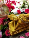 Watering Buddha In the Songkran festival