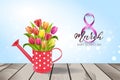 Watering can with bouquet of tulips Royalty Free Stock Photo