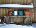 Outdoor potting bench covered in a thick layer of fresh snow.