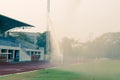 Watering the football field Royalty Free Stock Photo