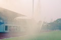 Watering the football field Royalty Free Stock Photo