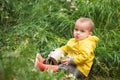 Watering the Meadow: A Youngster Having Fun Outdoors