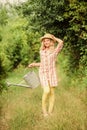 Watering plants in garden. Watering tools. Girl child hold watering can. Spring gardening checklist. Improve irrigation Royalty Free Stock Photo