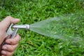 Watering to grass Royalty Free Stock Photo