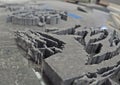 Stone Waterjet cut pieces on top of table at a marble factory - closeup