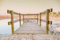 Waterless lake jetty at sunset in a town in Extremadura, Spain