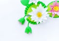 Waterlily flower made of paper. white background. Origami hobby. Gentle petal Royalty Free Stock Photo