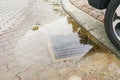 Waterlogged on street due to clogged drainage system Royalty Free Stock Photo