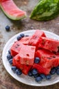 Watermelon and bluberry on the vintage plate Royalty Free Stock Photo