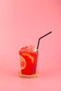 Watermelon citrus sangria in disposable take away plastic cup. Refreshing summer drink. Watermelon mojito fresh red drink Royalty Free Stock Photo