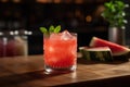 Watermelon cocktail, featuring a vodka or tequila-based drink mixed with fresh watermelon juice, served in a chilled glass