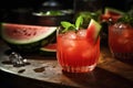 Watermelon cocktail, featuring a vodka or tequila-based drink mixed with fresh watermelon juice, served in a chilled glass