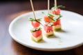 watermelon cubes and feta on bamboo skewers Royalty Free Stock Photo