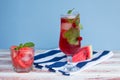 Watermelon drink with ice and watermelon slices. Royalty Free Stock Photo