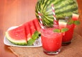 Watermelon drinks in glasses with slices of watermelon