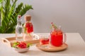 Watermelon drinks on the wooden background