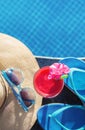 Watermelon fresh juice smoothie drink cocktail slippers, hat, sunglasses pool Royalty Free Stock Photo
