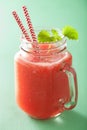 Watermelon lime smoothie in mason jars