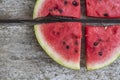 Watermelon pieces on the old board close up Royalty Free Stock Photo