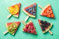 Watermelon pizza - slices with berries and fruits, granola. Fresh low carb diet