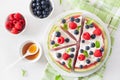 Watermelon pizza slices with yogurt and berries, summer dessert