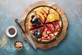 Watermelon pizza with various fruts