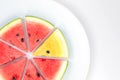 Watermelon red and yellow sliced on white plate Royalty Free Stock Photo