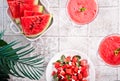 Watermelon refreshing summer frozen cocktail smoothie, watermelon slices and pieces and salad with watermelon and mint Royalty Free Stock Photo