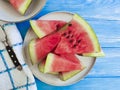 Watermelon ripe, nutritious healthy towel freshness sweet summertime on a blue wooden background Royalty Free Stock Photo