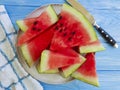 Watermelon ripe, nutritious healthy yummy towel freshness sweet summertime on a blue wooden background Royalty Free Stock Photo