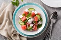 Watermelon salad with feta cheese on gray background Royalty Free Stock Photo