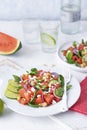 Watermelon salad on white table Royalty Free Stock Photo