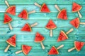 Watermelon slice popsicles on blue wood background, fresh fruit concept Royalty Free Stock Photo