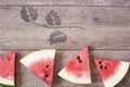 Watermelon slices on a wooden background. Natural light. Copy space, fruit frame Royalty Free Stock Photo