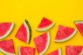 Watermelon slices on yellow background with copy space, summer fruit concept Royalty Free Stock Photo