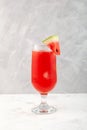 Watermelon smoothie or watermelon iced punch. Refreshing summer drink on grey background. Selective focus Royalty Free Stock Photo