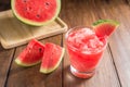 Watermelon smoothie on wooden background Royalty Free Stock Photo