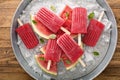 Watermelon and strawberry popsicles