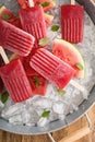 Watermelon and strawberry popsicles Royalty Free Stock Photo