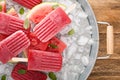 Watermelon and strawberry popsicles Royalty Free Stock Photo