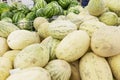 Watermelons and melons in the supermarket. Large selection of seasonal berries