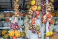 Watermelons, onions and melons are sold in market on the side of the road