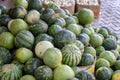 Watermelons for sale. Large ripe green striped watermelons in the organic market, store
