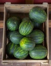 watermelons fruits in a wooden box at the farm market organic food Royalty Free Stock Photo