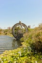 Watermill in lake pond in Green Point Park Cape Town Royalty Free Stock Photo
