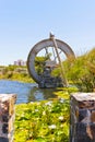 Watermill in lake pond in Green Point Park Cape Town Royalty Free Stock Photo