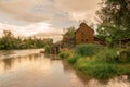 Watermill on the river sunset Royalty Free Stock Photo