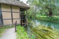 Watermill by Sai river (Sai-Gawa) near Daio Wasabi Farm in Azumino, Japan Royalty Free Stock Photo