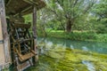 Watermill by Sai river Sai-Gawa near Daio Wasabi Farm in Azumino, Nagano Prefecture, Japan Royalty Free Stock Photo