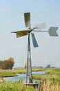 Watermill in vertical Dutch landscape Royalty Free Stock Photo